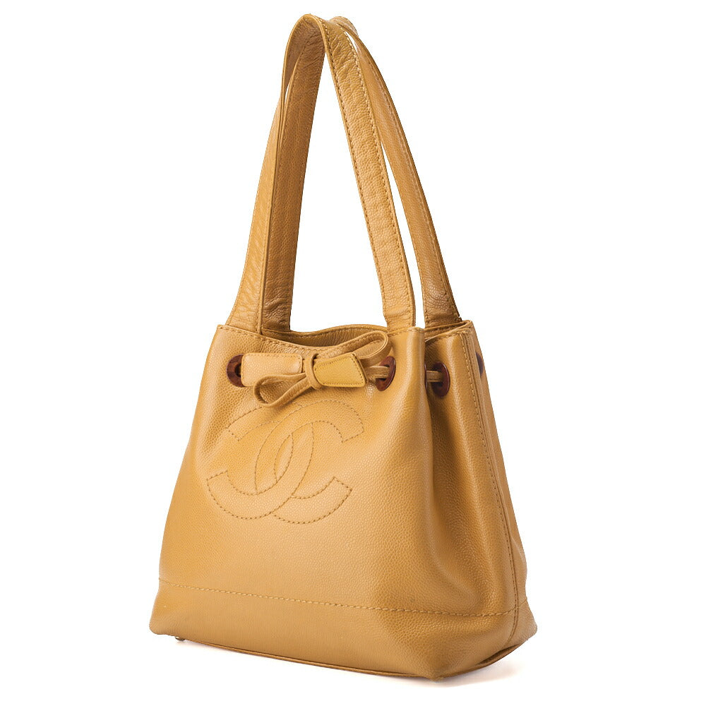 Gebrauchte Schultertasche aus Kaviarleder, beigefarbenes Holz, goldfarbene Metallteile