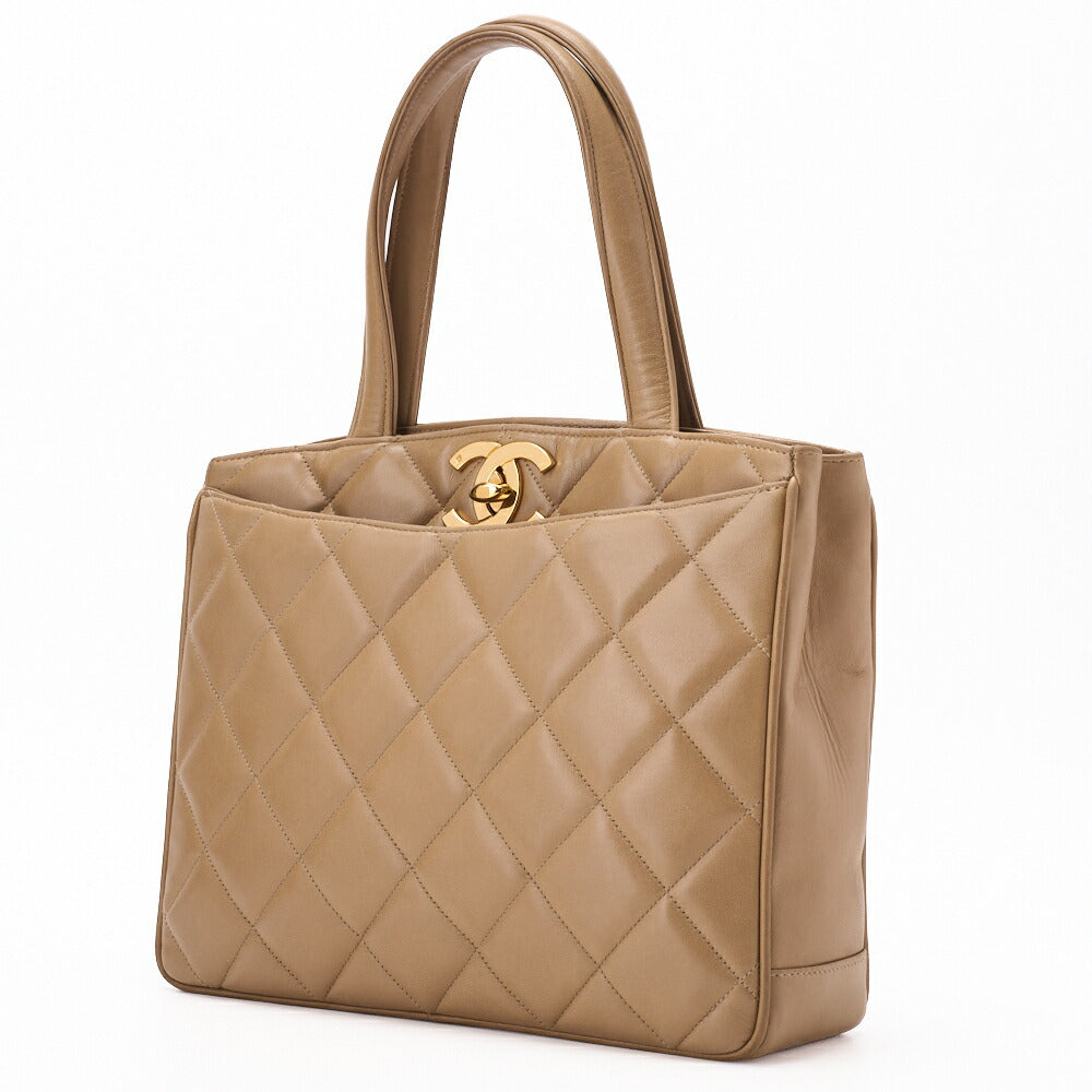 Gebrauchte Handtasche Matelassé Drehverschluss Lammleder Beige Goldfarbene Hardware Gebraucht